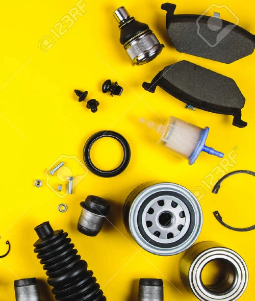 131556132 set of car parts for maintenance on yellow background